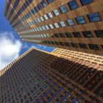 brown concrete building under blue sky during daytime