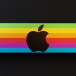 Vibrant rainbow-colored design featuring a prominent logo on a sleek black background.