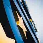 blue and yellow building under blue sky during daytime