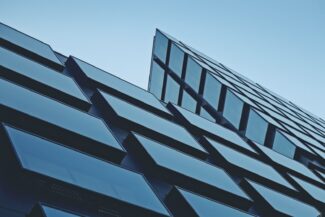 A tall building with lots of windows on top of it