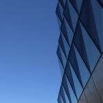 gray concrete building under blue sky during daytime