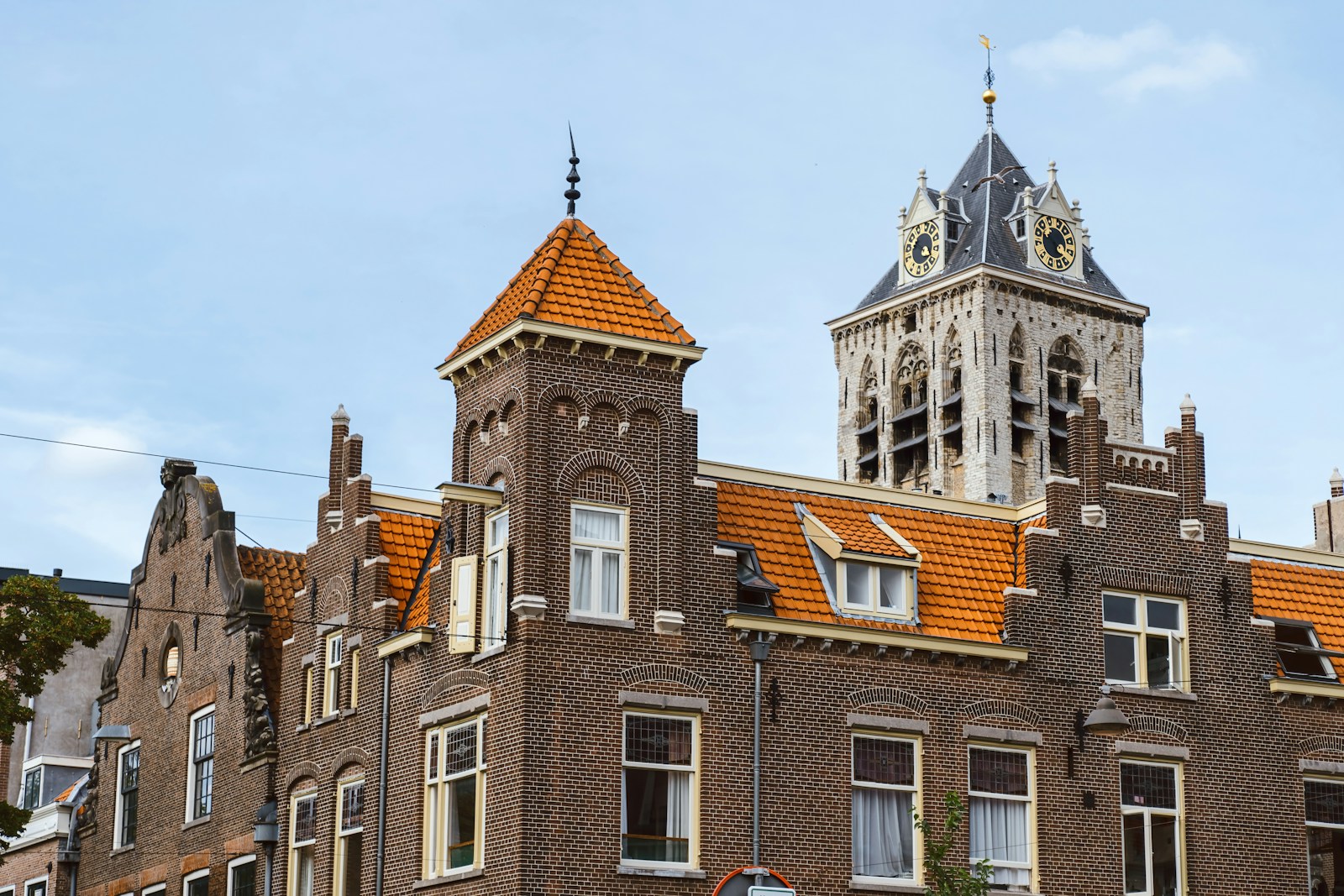 a tall brick building with a clock tower