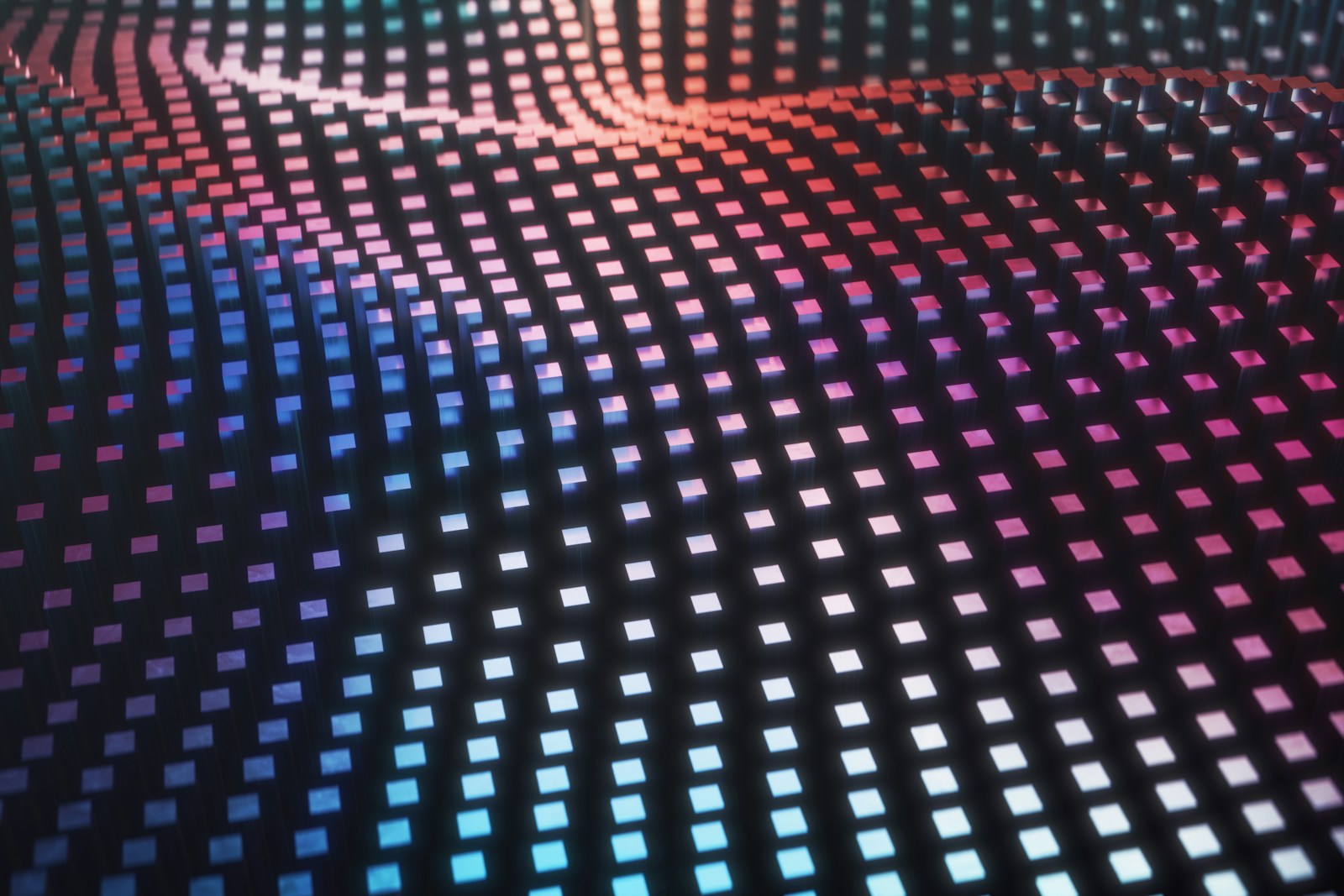 A grid of cubes forming a wave pattern with blue and pink lighting